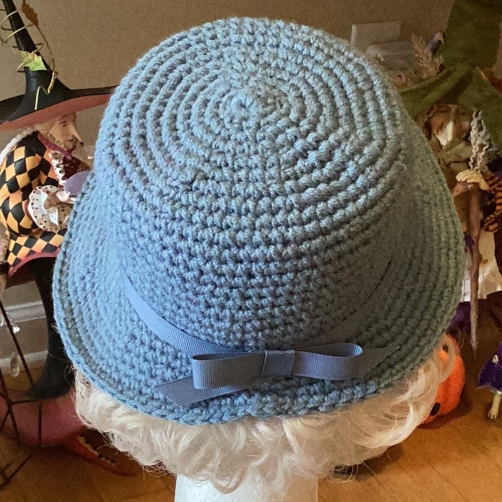 B1G1FREE   Medium blue hand knit short brim hat.  Brim is shorter in back.